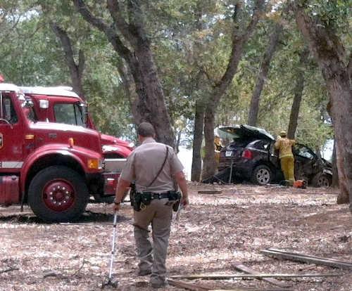 Janice Smith of Kelseyville, Calif., was injured in a single-vehicle crash on the morning of Tuesday, July 8, 2014. Photo by John Thompson. 070814buckinghamwreck