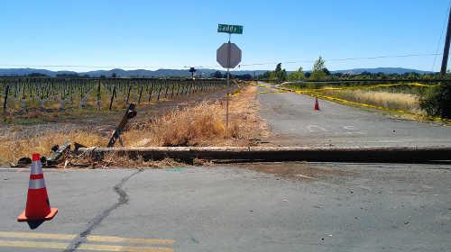 A power pole near Kelseyville, Calif., was sheared off as the result of a vehicle crash on Friday, July 11, 2014. Photo by Eric Wheaton. 071114wheatonpolecrash