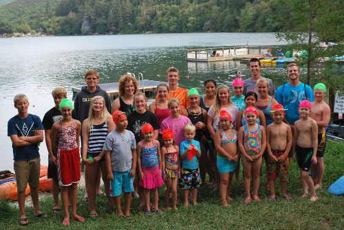 Thirty-four swimmers participated in the fourth annual Blue Lakes Open Water swim on Monday, August 4, 2014, in Upper Lake, Calif. Pictured above are Nick Dobusch, Owen Lawler, Robin Adams, Lauren Rudnick, Tim Peterson, Antonio Batres, Nicole Hanson, Kaylie Williams, Catherine Braider, Charlie Adams, Jenna Williams, Elliana Galvin, Landon Williams, Emma Larson, Maria Tinoco, Shannon Fronsman, Sienna Hickey, Berlin Rudolph, Carter Rudolph, Gary White, Zoey Zander, Alondra Aguilar, Danielle Erickson, Connor Disney, Brandon Disney, Liam Wayment, Robert Chavez, JC Chavez, Nafisa Jamil, Sebastian Chavez, and Riley Lopez. Photo courtesy of the Channel Cats. 080414channelcatsbluegroup