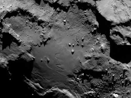 Close up detail focusing on a smooth region on the “base” of the “body” section of comet 67P/Churyumov-Gerasimenko. The image was taken by Rosetta’s Onboard Scientific Imaging System (OSIRIS) on Wednesday, August 6, 2014. Credits: ESA/Rosetta/MPS for OSIRIS. 080614rosetta