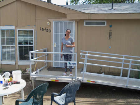 Lake County, Calif., veteran Mona Allen on her new wheelchair ramp. Photo courtesy of Habitat for Humanity Lake County. habitatramps