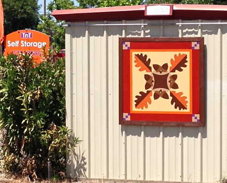 “Oak Leaves and Acorns,” the 50th quilt block on the Lake County Quilt Trail, has been installed on TnT Mini Storage in Kelseyville, Calif. Photo courtesy of the Lake County Quilt Trail. lcqttnttrail