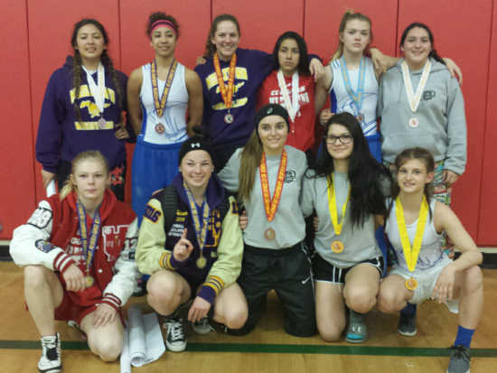 Shown, from left to right, bottom row, Christina Wilson, Kailei Foltmer, Emily Psalmonds, Alicia Ledesma, Krystal Lockwood; top row, Isabella Quintana-Ocken, Abebreanna Gonzalez, Alixe Olson, Adriana Lopez, Mikelynn Rowe and Jasmin Clarke at the Girls North Coast Section Wrestling Tournament. The tournament took place on Friday, February 12, and Saturday, February 13, 2016, in Albany, Calif. All 11 brought home medals, and Clarke, Foltmer, Lopez, Olson, Psalmonds, Quintana-Ocken and Wilson now advance to the state championships. Photo courtesy of Rick Pyorre. 021316cifgirlswrestlers