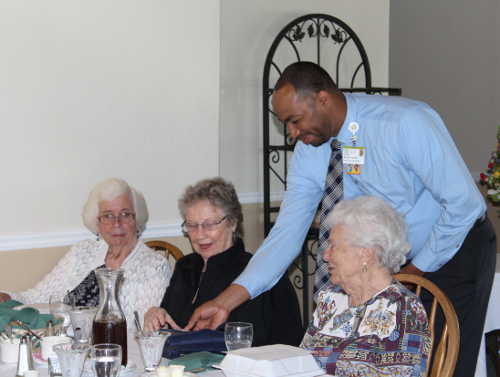 D’Andre Campbell presents a volunteer award to Ardell Kochell at the Volunteer Appreciation Luncheon on Wednesday, April 20, 2016, in Hidden Valley Lake, Calif. Photo courtesy of St. Helena Hospital Clear Lake. 042016volunteerlunch