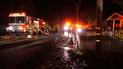 Work at the scene of a structure fire in Nice, Calif., continued early on the morning of Tuesday, August 18, 2015. Photo by Elizabeth Larson/Lake County News. 081815nicefireelarson2