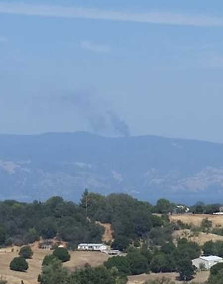 Kameron Disney took this picture of the fire on Bartlett Springs Road in Lucerne, Calif., from Lakeport, Calif., on Wednesday, August 19, 2015. 081915kamerondisneybartlettfire