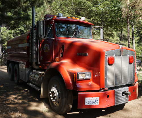 Water tender 9011, based at the Northshore Fire Protection District's station in Upper Lake, Calif., will be replaced thanks to a new federal grant. The truck is pictured at the scene of a fire on Bartlett Springs Road near Lucerne, Calif., on Wednesday, August 19, 2015. Photo by Elizabeth Larson/Lake County News. 081915watertender9011