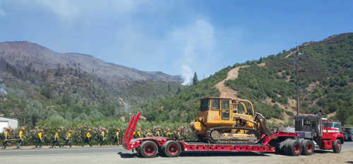 Firefighters work at the scene of the Elk fire in Upper Lake, Calif., on Thursday, September 3, 2015. Photo courtesy of Cal Fire. 090315elkfiredozer