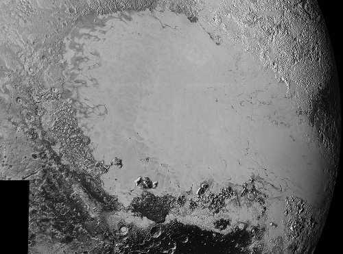 Mosaic of high-resolution images of Pluto, sent back from NASA’s New Horizons spacecraft from Sept. 5 to 7, 2015. The image is dominated by the informally-named icy plain Sputnik Planum, the smooth, bright region across the center. This image also features a tremendous variety of other landscapes surrounding Sputnik. The smallest visible features are 0.5 miles in size, and the mosaic covers a region roughly 1,000 miles wide. The image was taken as New Horizons flew past Pluto on July 14, 2015, from a distance of 50,000 miles. Credits: NASA/Johns Hopkins University Applied Physics Laboratory/Southwest Research Institute. 091015plutomosaic