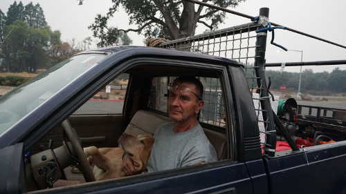Scott Freeman of Ukiah, Calif., and his dog, Buddy, came to Kelseyville, Calif., on Sunday, September 13, 2015, to help evacuate community members forced to evacuate earlier that day due to the Valley fire. Photo by Elizabeth Larson/Lake County News. 091315valleyfirescottfreeman