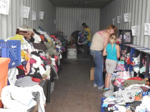 Local business owner Phil Harris, and his staff and friends from Performance Mechanical, are manning a donation/pick-up site in the parking lot at Clearlake, Calif., Walmart to assist victims of the Valley Fire. There is an abundance of clothing of sizes, infant to adult, available to evacuees in need. Donations of tarps and tents are needed. Photo by Denise Rockenstein/Lake County News. 091415valleyfiretrailer