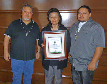 From left, Koi tribal members Dino Beltran, Judy and Rob Morgan with the Governor’s Historic Preservation Award for “A Walk Through Time” on Thursday, November 19, 2015,, in Sacramento, Calif. Photo courtesy of Dr. John Parker. 111915filmawardkoigroup