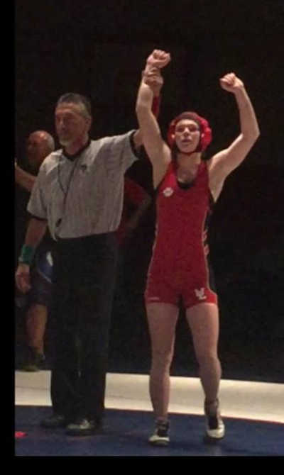A force to be reckoned with: Upper Lake High School wrestler Christina Lopez is the North Coast Section champion in the 121-pound girls wrestling division. She's also tough enough to beat boys in the same class. Photo courtesy of Denae Maddock. 2015cifsectionchristinawilsonwins