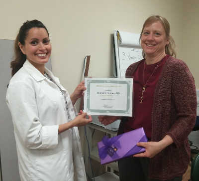 Dr. Pari Azari (left) presents a Community Leadership to Dr. Kimberly Fordham (right). Courtesy photo. doctorawardsfordham