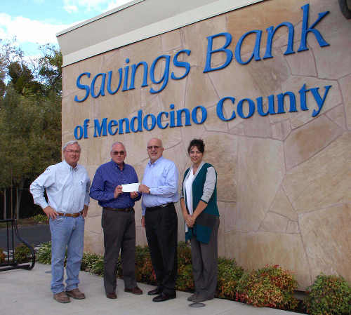 Savings Bank of Mendocino County donated $20,000 to #LakeCountyRising. In this photo: David Weiss, SBMC Board Member; Bill Groody, Lake County Wine Alliance Board Member; Pete Dodson, SBMC Loan Officer; and Susie Robinson, SBMC Lakeport Branch Manager. Courtesy photo. lcrisingsavingsbank