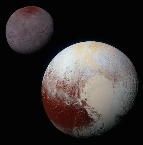 This composite of enhanced color images of Pluto (lower right) and Charon (upper left), was taken by NASA’s New Horizons spacecraft as it passed through the Pluto system on July 14, 2015. This image highlights the striking differences between Pluto and Charon. The color and brightness of both Pluto and Charon have been processed identically to allow direct comparison of their surface properties, and to highlight the similarity between Charon’s polar red terrain and Pluto’s equatorial red terrain. Pluto and Charon are shown with approximately correct relative sizes, but their true separation is not to scale. The image combines blue, red and infrared images taken by the spacecraft’s Ralph/Multispectral Visual Imaging Camera. Credits: NASA/JHUAPL/SwRI. plutoandcharon