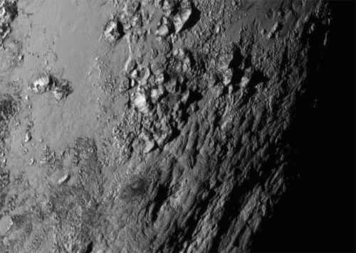 This close-up image of a region near Pluto’s equator captured by NASA’s New Horizons spacecraft on July 14, 2015 reveals a range of youthful mountains rising as high as 11,000 feet above the surface of the dwarf planet. This iconic image of the mountains, informally named Norgay Montes (Norgay Mountains) was captured about 1 ½ hours before New Horizons’ closest approach to Pluto, when the craft was 47,800 miles from the surface of the icy body. The image easily resolves structures smaller than a mile across. The highest resolution images of Pluto are still to come, with an intense data downlink phase commencing on Sept. 5, 2015. Credits: NASA-JHUAPL-SwRI. plutosurfaceflyby
