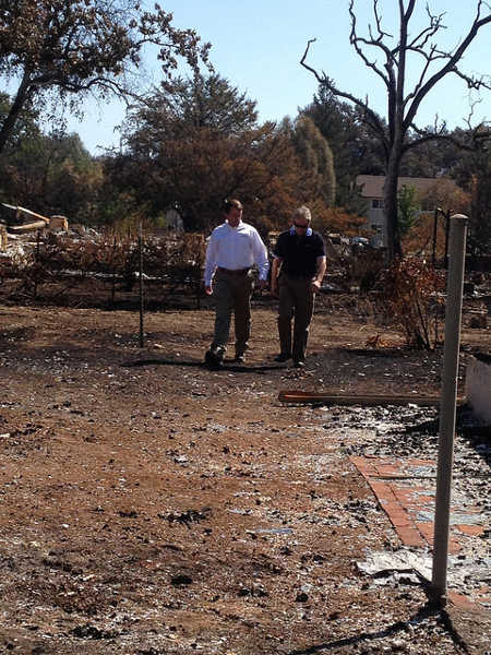 California Insurance Commissioner Dave Jones visits a property burned by the Valley fire in Lake County, Calif., in September 2015. Photo courtesy of the California Department of Insurance. sept2015valleyfirejones