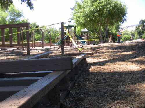 A vehicle crash in Lucerne, Calif., on Wednesday, June 29, 2016, damaged a wooden fence at Lucerne Harbor Park. Photo by John Jensen/Lake County News. 062916lucernefencecrash
