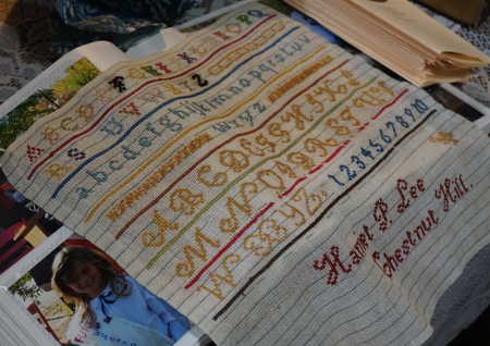 An embroidery sampler completed by Harriet Lee Hammond when she was a girl in Massachusetts. The item was on display at the Hammond Library for the centennial celebration on Sunday, October 16, 2016. Photo by Elizabeth Larson/Lake County News. 101616harriethammondsampler