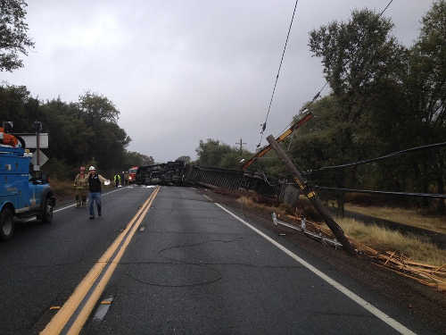 A big rig rollover resulted in a downed power pole and a temporary closure on a portion of Highway 29 near Kelseyville, Calif., on Thursday, October 27, 2016. Photo courtesy of the California Highway Patrol Clear Lake Area office. 102716semipolecrash