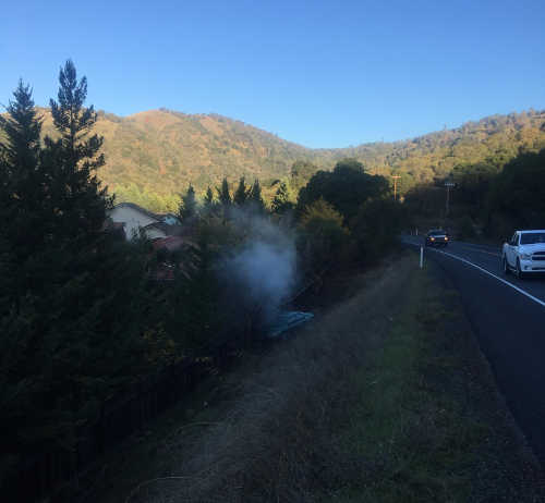 A cloud of liquid propane resulted from a vehicle crash involving a propane tank on the morning of Friday, November 4, 2016, near Clearlake Oaks, Calif. Nearby Highway 20 was closed for about an hour in an effort to keep the propane from igniting. Photo courtesy of Jay Beristianos. 110416paradisecovecrash2