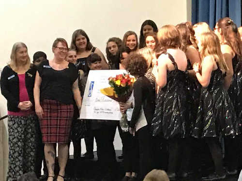 Soroptimist International of Clear Lake members Julie Moyer and Ami Landrum present a check for $1,350 to music teacher Cydney Dixon and her students at Konocti Education Center on Thursday, December 8, 2016, in Clearlake, Calif. Courtesy photo. 120816siclpresentcheck1