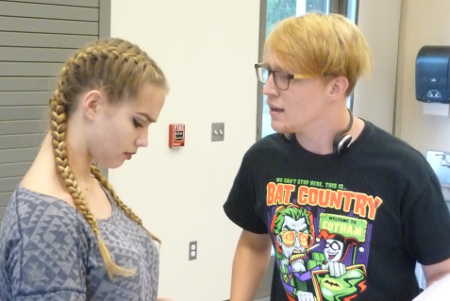 Demetrius (Christopher Griffith) pleads with Helena (Hayley Martin) during rehearsals for the “Shakespeare at the Lake” production of “A Midsummer Night’s Dream.” Photo by C. Richard Smith. midsummerlysanderhelena
