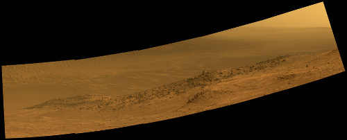 This scene from NASA's Mars rover Opportunity shows "Wharton Ridge," which forms part of the southern wall of "Marathon Valley" on the rim of Endeavour Crater. The ridge's name honors the memory of astrobiologist Robert A. Wharton (1951-2012). The scene is presented in approximately true color. Credits: NASA/JPL-Caltech/Cornell/Arizona State Univ. nasamarswhartonridge