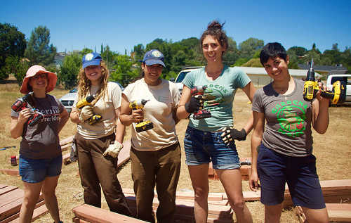 Lake County Gardens Project Coordinator Ava Ryan (second from right) works with volunteers to build raised garden beds. Courtesy photo. ncogardensproject