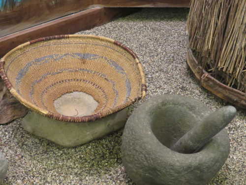 A mortar, pestle and hopper at the Courthouse Museum in Lakeport, Calif. Photo by Kathleen Scavone. scavonebasketmortar