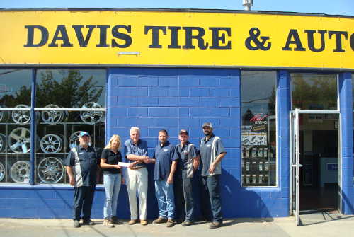 Pictured are Todd Coburn, Marci McDaniels-Davis, Habitat for Humanity President Richard Birk, Ric Davis, Ted Horat and Dan Beaty. Courtesy photo. sept2016davisautohabitatdonation