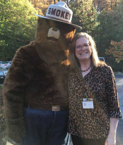 Superintendent Catherine Stone of the Middletown Unified School District in Middletown, Calif., and Smokey Bear. Courtesy photo. stoneandsmokey